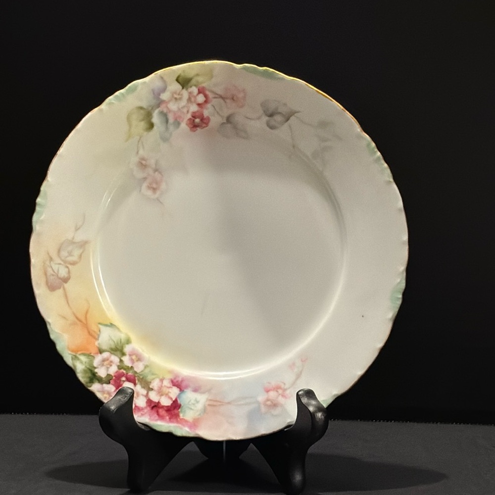 Vintage 7” plate . Marked Germany /Versailles . Very pretty.  No chips .